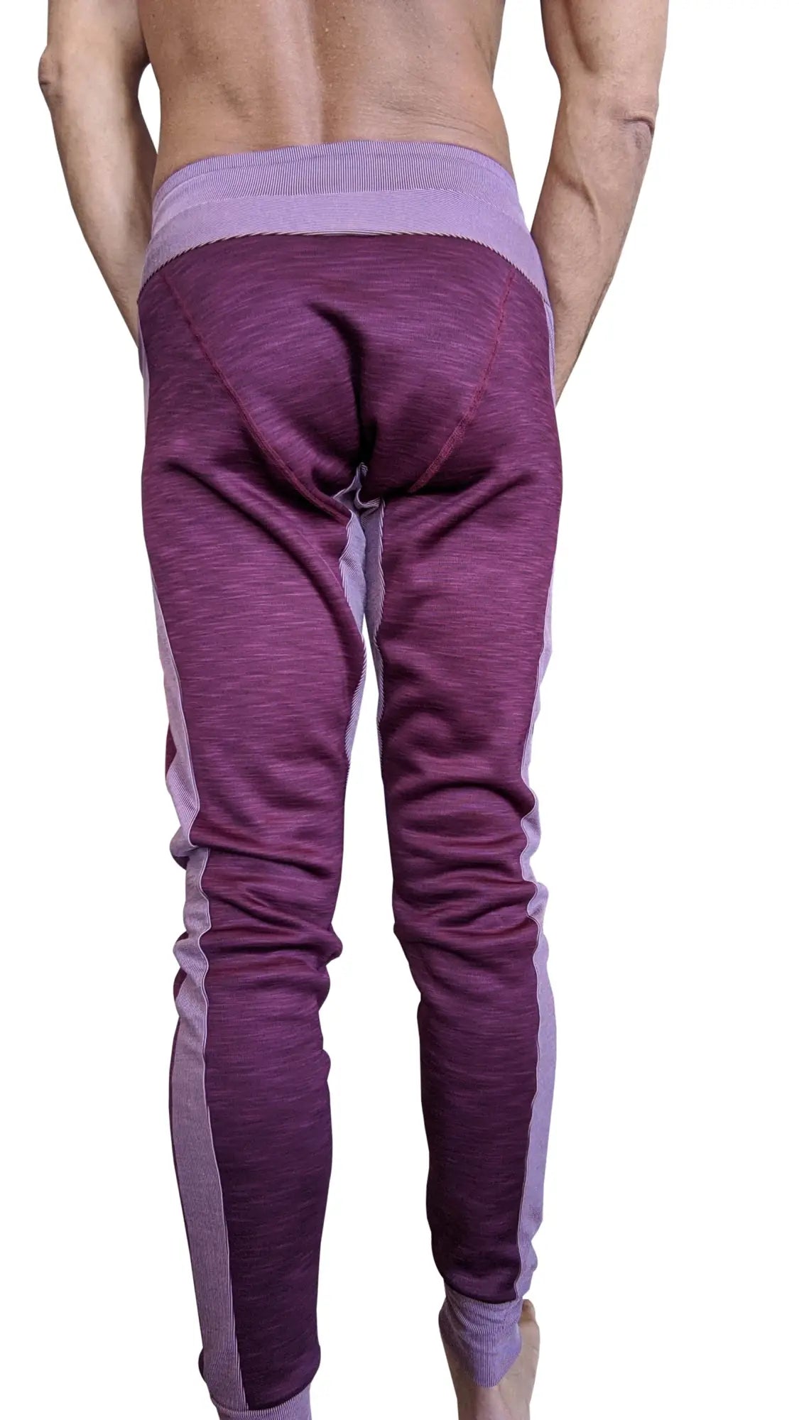 Winter edition plum purple fleece jogger pants with textured fabric and lighter purple side panels for yoga and running