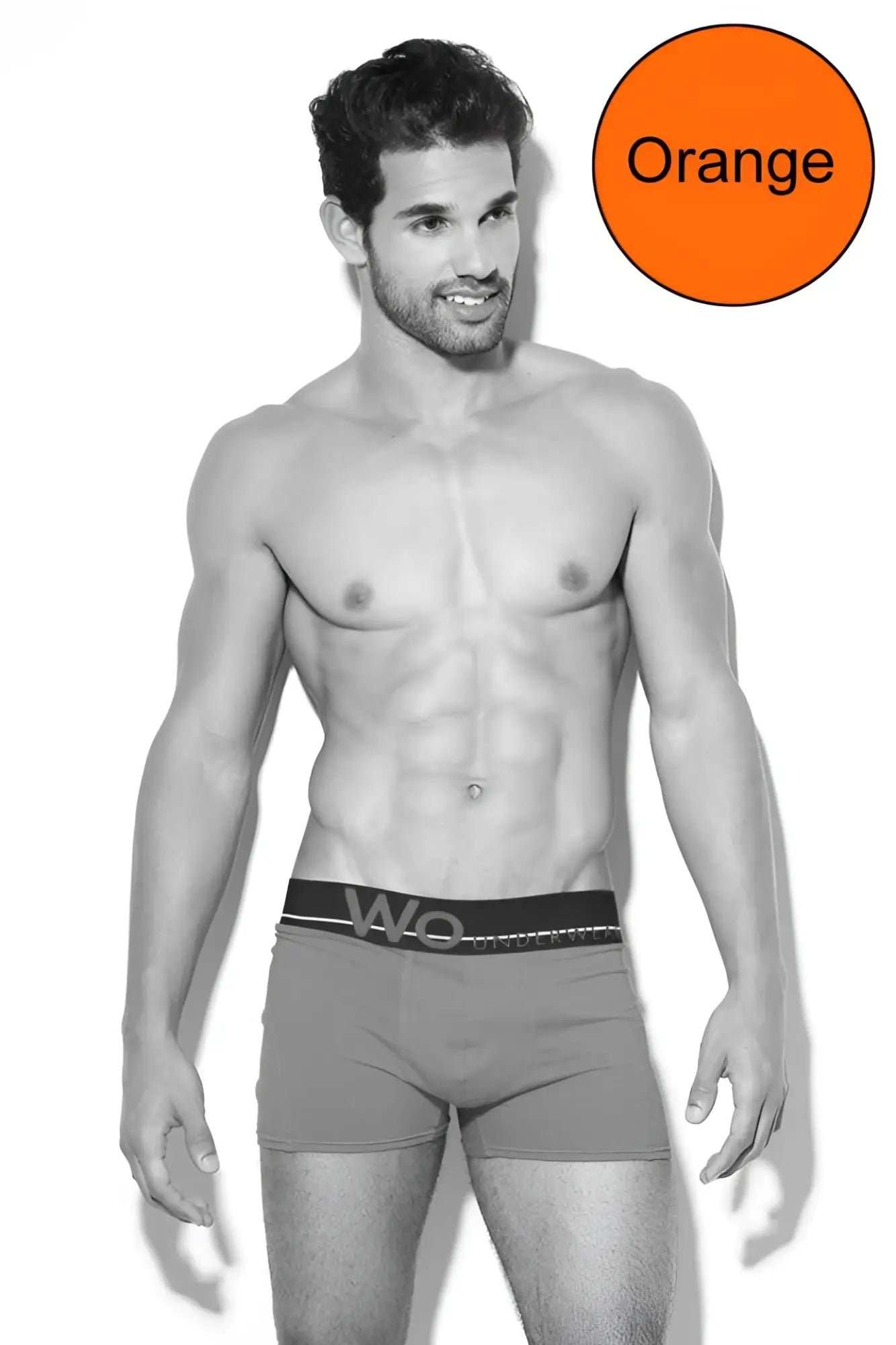 Orange waistband with wo logo on black elastic band of wo underwear solid boxer brief underwear size s