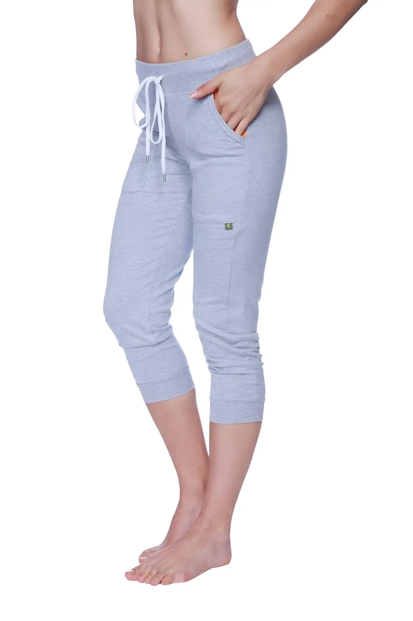 Women’s 3/4 cuffed capri yoga pants in light gray heather with white drawstring waistband and side pockets