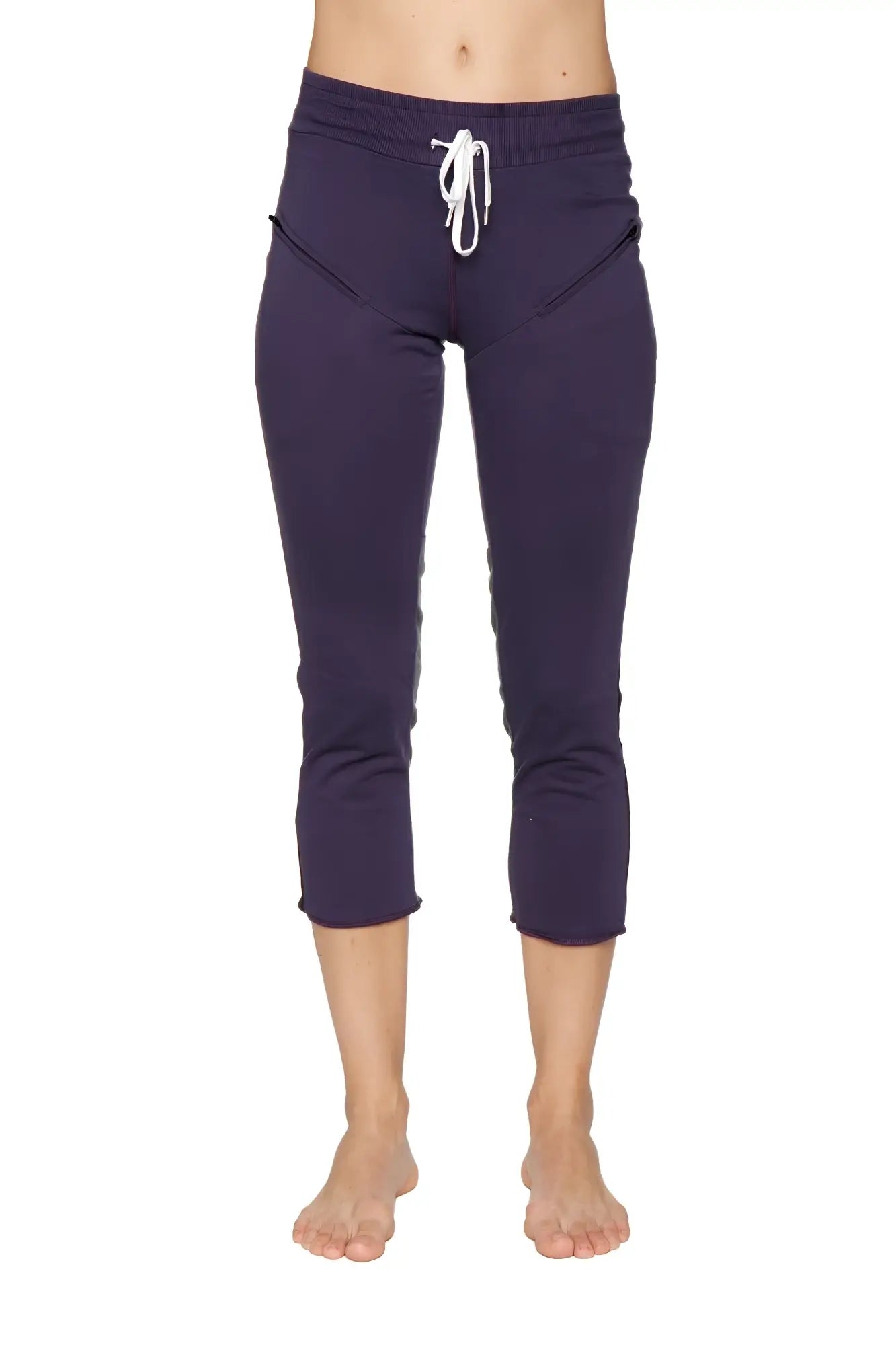 Women’s navy blue capri yoga pants with white drawstring waistband and side pockets for activewear and comfort