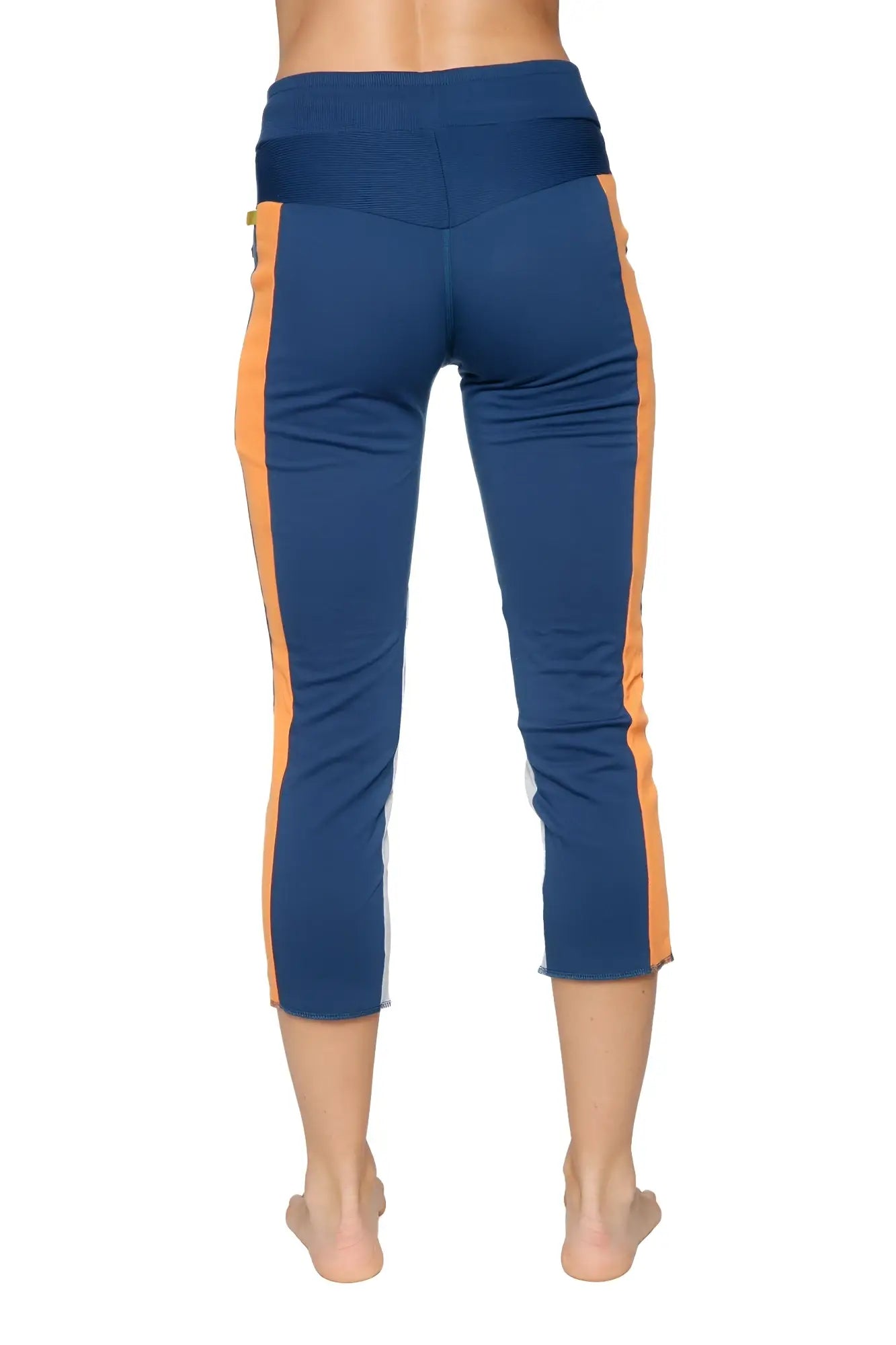 Women’s 4/5 length zip pocket capri yoga pants in royal blue with orange and grey high-waisted athletic design