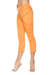 Women’s sun orange 4/5 length capri yoga pants with white drawstring waistband and side zippered pocket