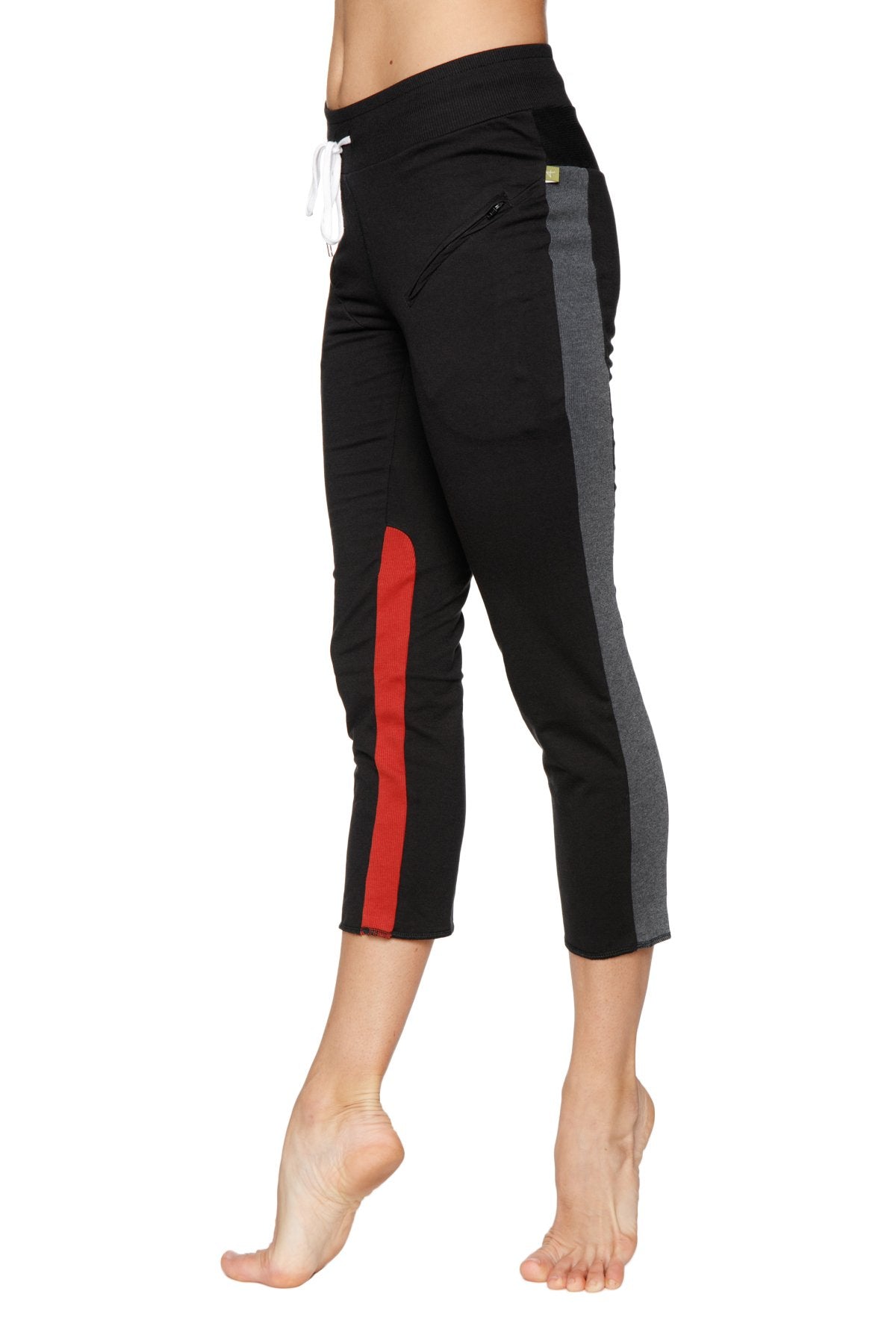 Women’s black 4/5 length capri yoga pants with gray and red side stripes and elastic waistband with white drawstring