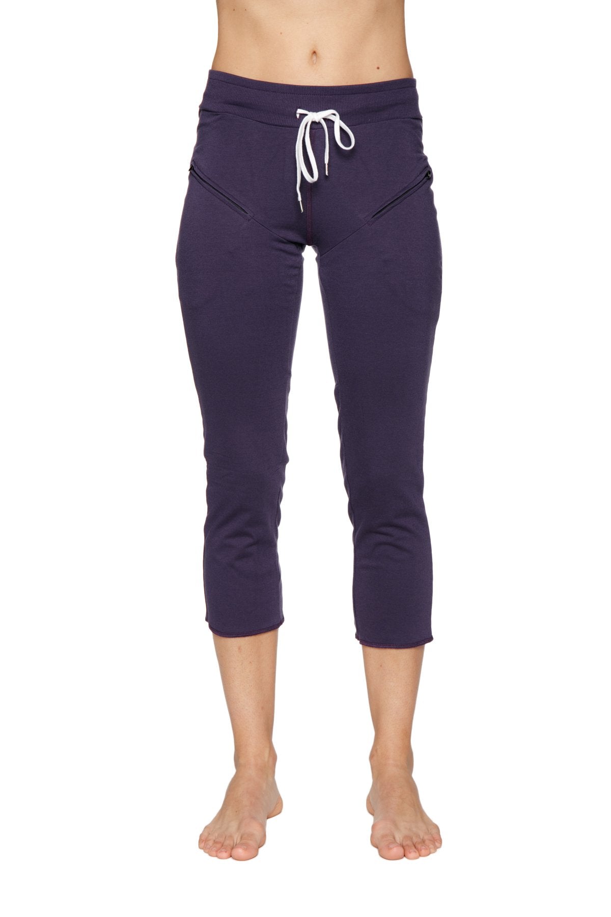Women’s navy blue 4/5 length capri yoga pants with white drawstring waistband and side pockets for activewear