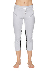 Women’s grey capri-length zipper pocket yoga pants with black side stripes and white drawstring waistband