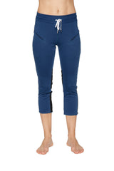 Women’s royal blue 4/5 length zipper pocket capri yoga pants with black side panels and white drawstring waistband