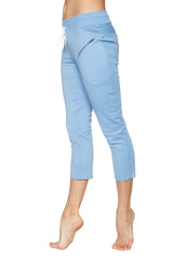 Light blue women’s 4/5 length capri yoga pants with white drawstring waistband and zipper pockets