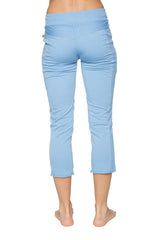 Women’s sky blue capri yoga pants with a high-waisted design, stretchy fabric, subtle side ruching, and zipper pockets