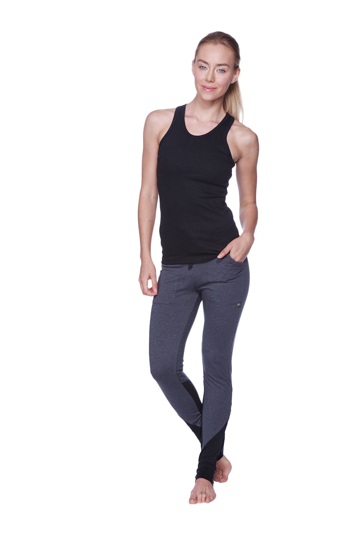 Women’s all-american racerback tank top in black paired with black and gray sleek form-fitting athletic leggings