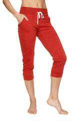 Women’s cinnabar red cuffed jogger yoga pant with white drawstring waistband and side pockets in capri length