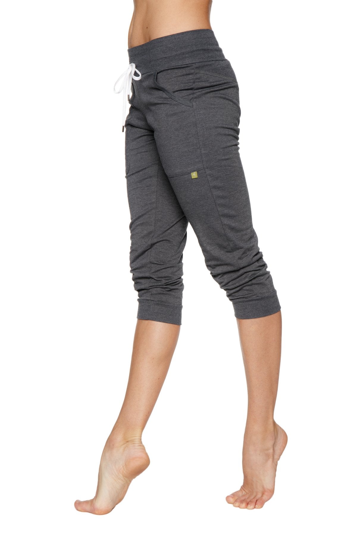 Dark gray cuffed jogger yoga pant with white drawstring waistband and elastic cuffs for women in solid charcoal