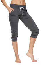 Women’s cuffed jogger yoga pants in solid charcoal with white drawstring waistband and elastic cuffs in dark gray