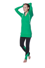 Women’s long body hoodie top in solid bamboo green with long sleeves white drawstrings and v-neckline