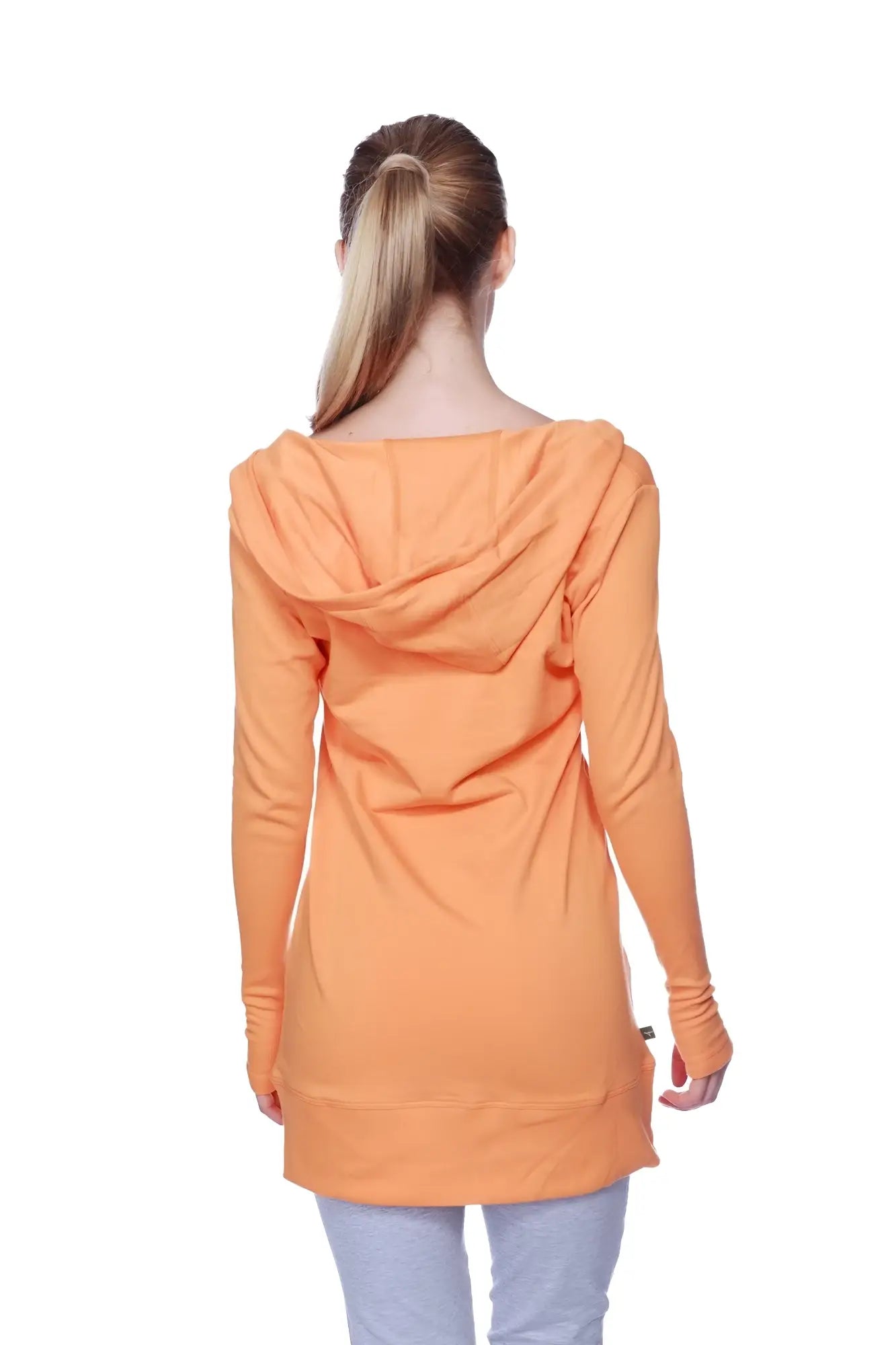 Women’s long body hoodie top in solid sun orange with relaxed fit and ribbed cuffs for casual wear