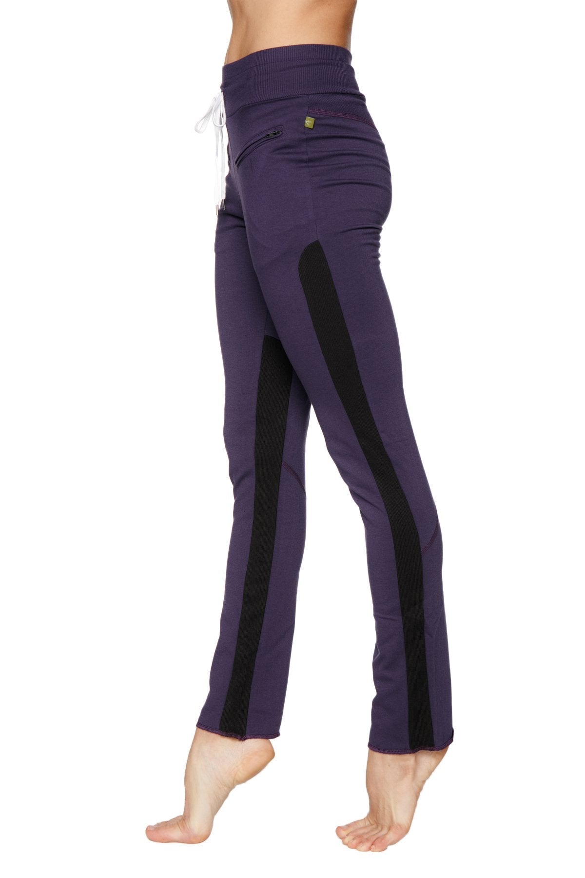 Women’s organic boyfriend yoga training pant in purple with black side stripes and white drawstring waistband