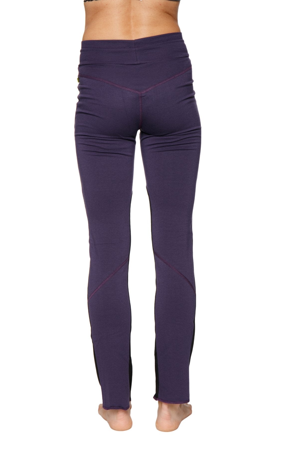 Purple high-waisted women’s organic boyfriend yoga training pant with sleek fit and subtle side seam detailing