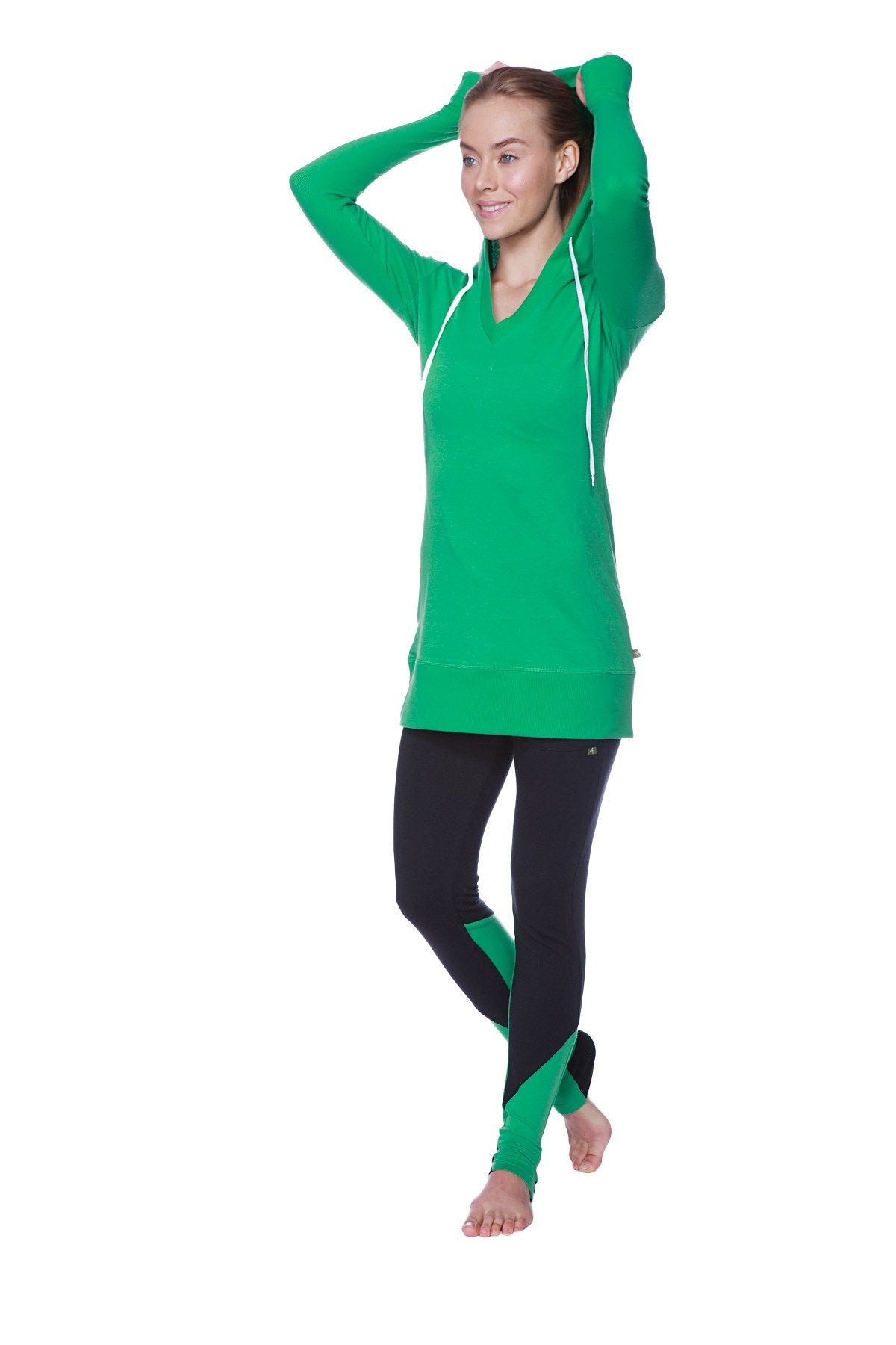 Women’s green long-sleeved performance hoodie with white drawstrings and v-neckline for activewear