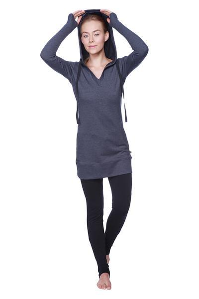 A dark gray long-sleeved hooded top with v-neck and drawstrings paired with women’s performance yoga pant
