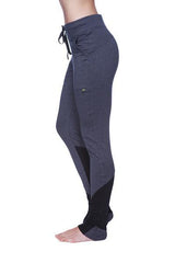 Women’s performance yoga pant in dark gray and black with drawstring waistband side pockets and reinforced ankle cuffs