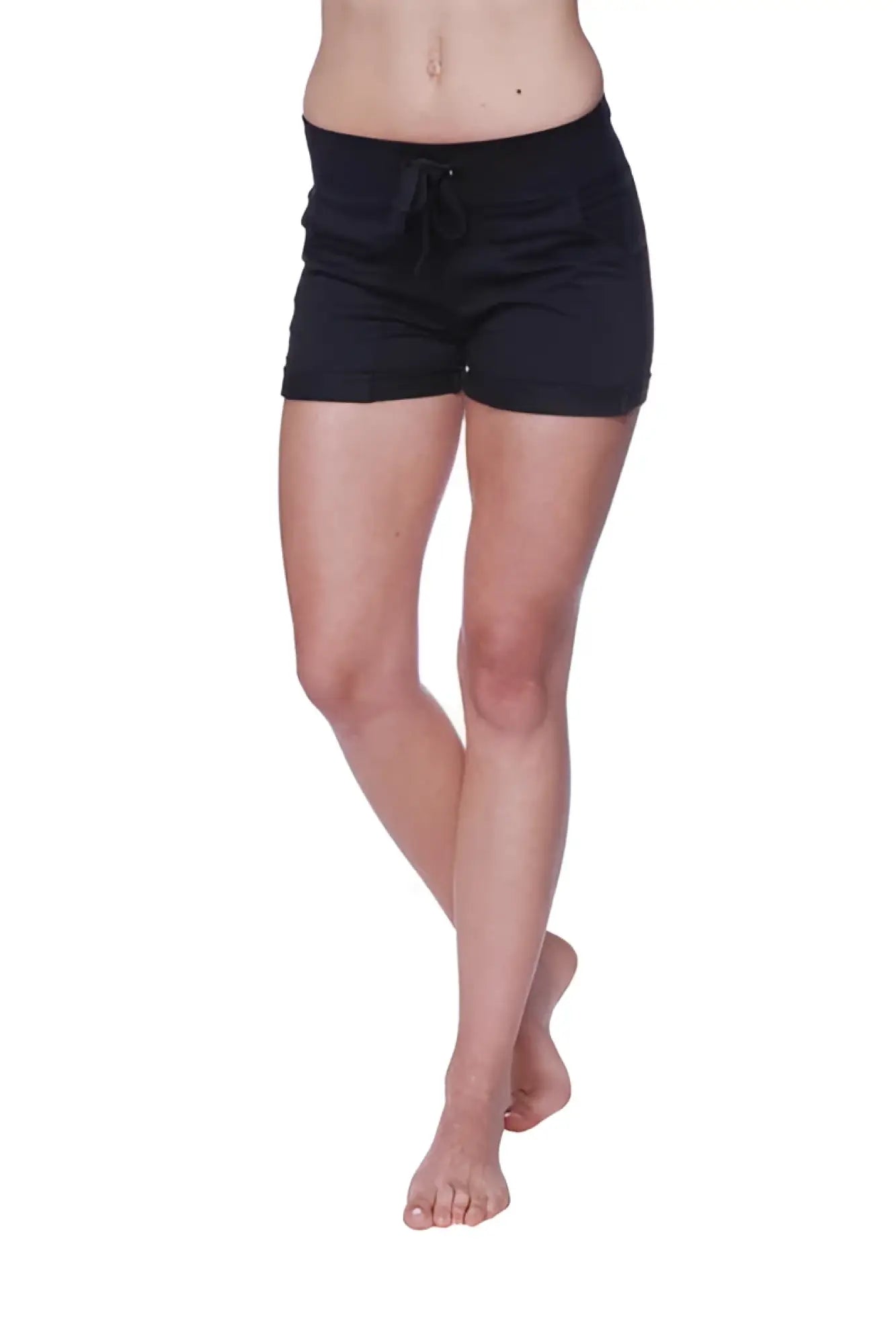 Women’s performance yoga shorts in black with a relaxed fit and side pockets for comfortable active wear