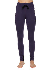 Women’s straight-leg long performance yoga pants in purple high-waisted leggings with black drawstring and side pockets