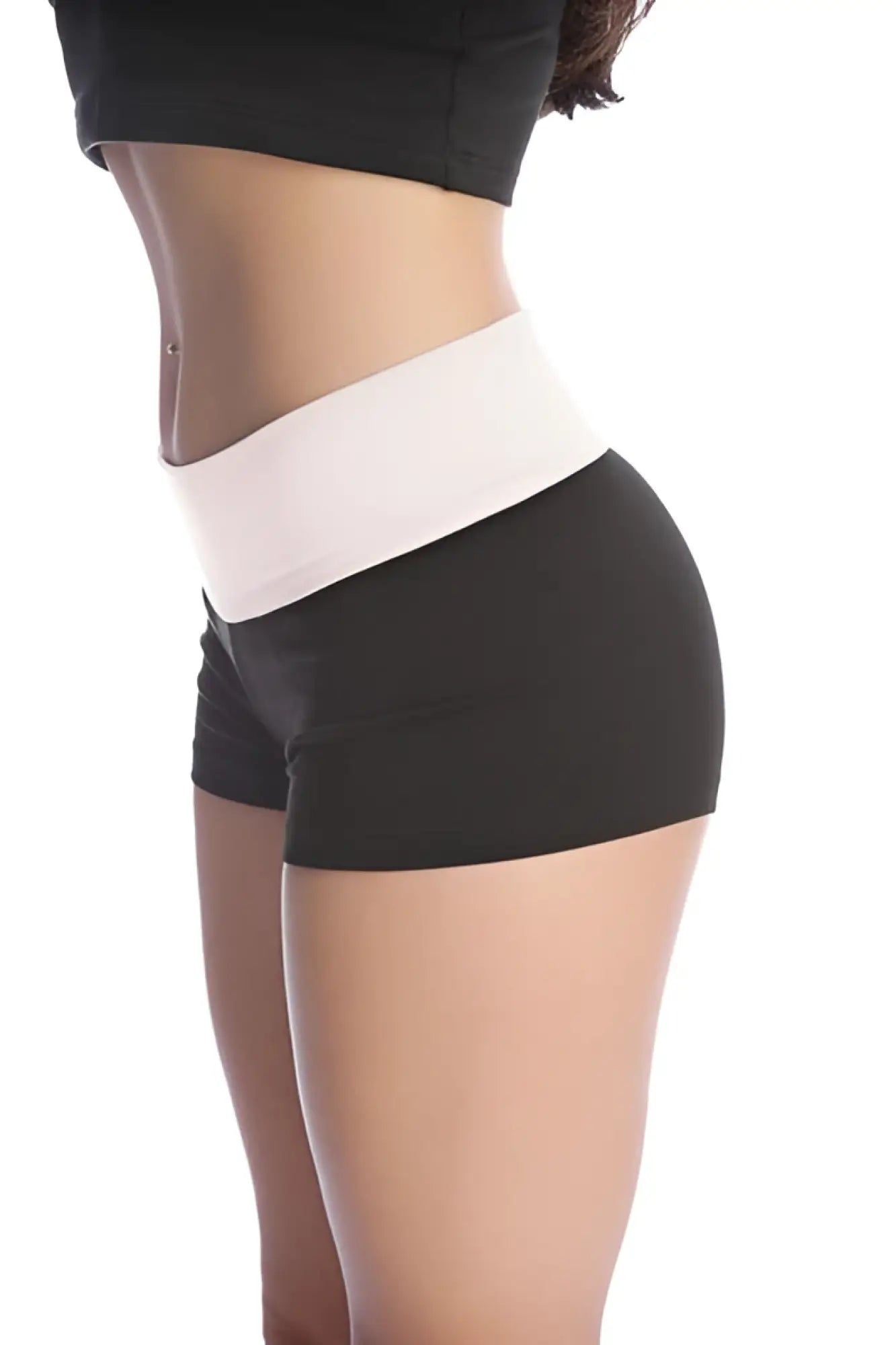Womens yoga transition short in black and white with a wide contrasting waistband for athletic use