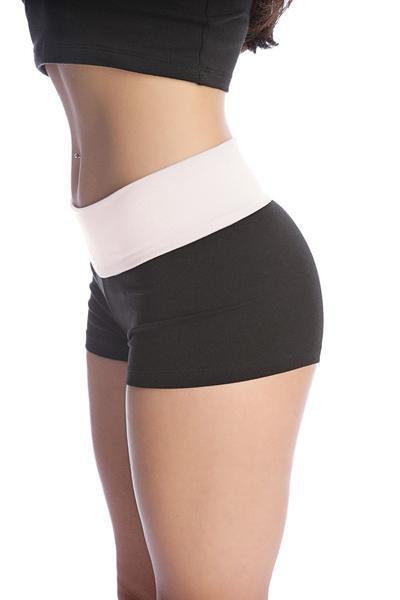 Womens yoga transition short in black and white with a wide contrasting waistband for athletic use