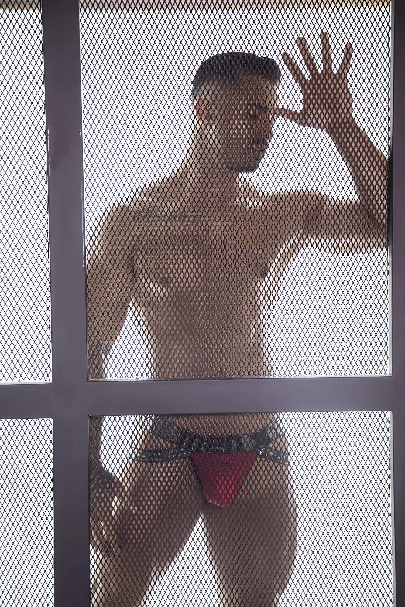 Red microfiber xtremen 91084 pride jockstrap with black patterned waistband showing front side