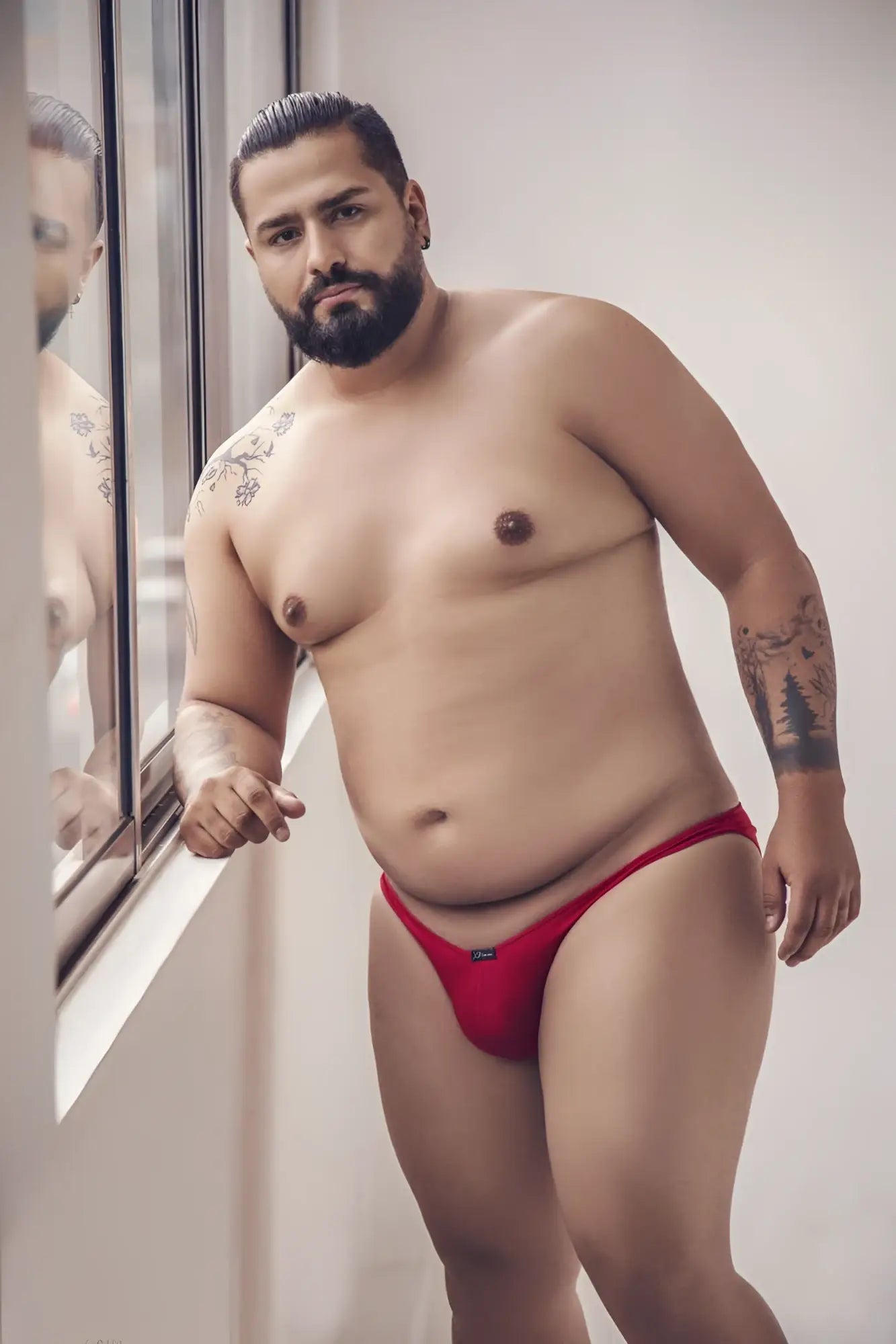 Red men’s microfiber bikini briefs xtremen 91093x with small black logo on the left hip