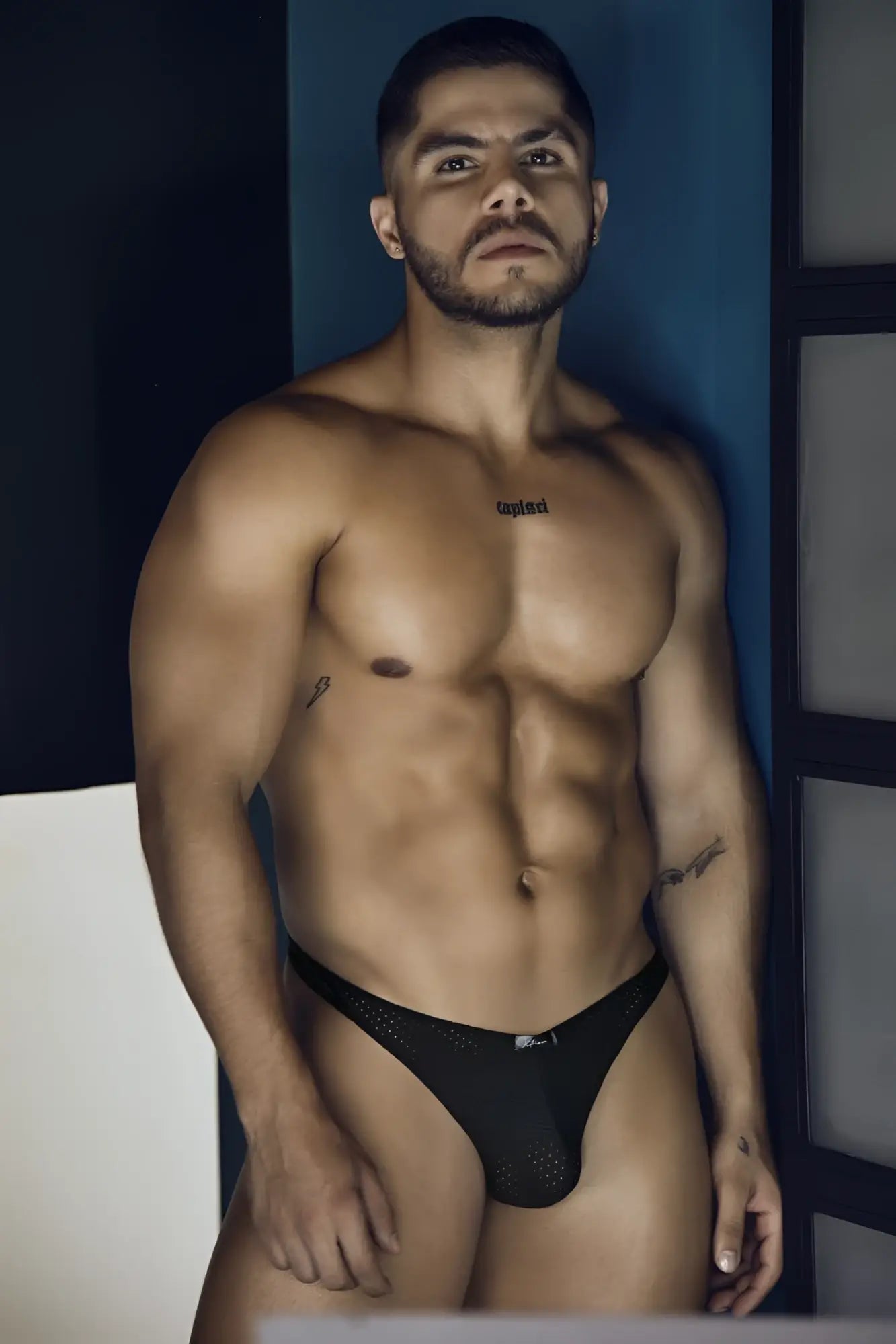 Black xtremen 91214b microfiber thongs with mesh briefs and subtle logo on waistband front view