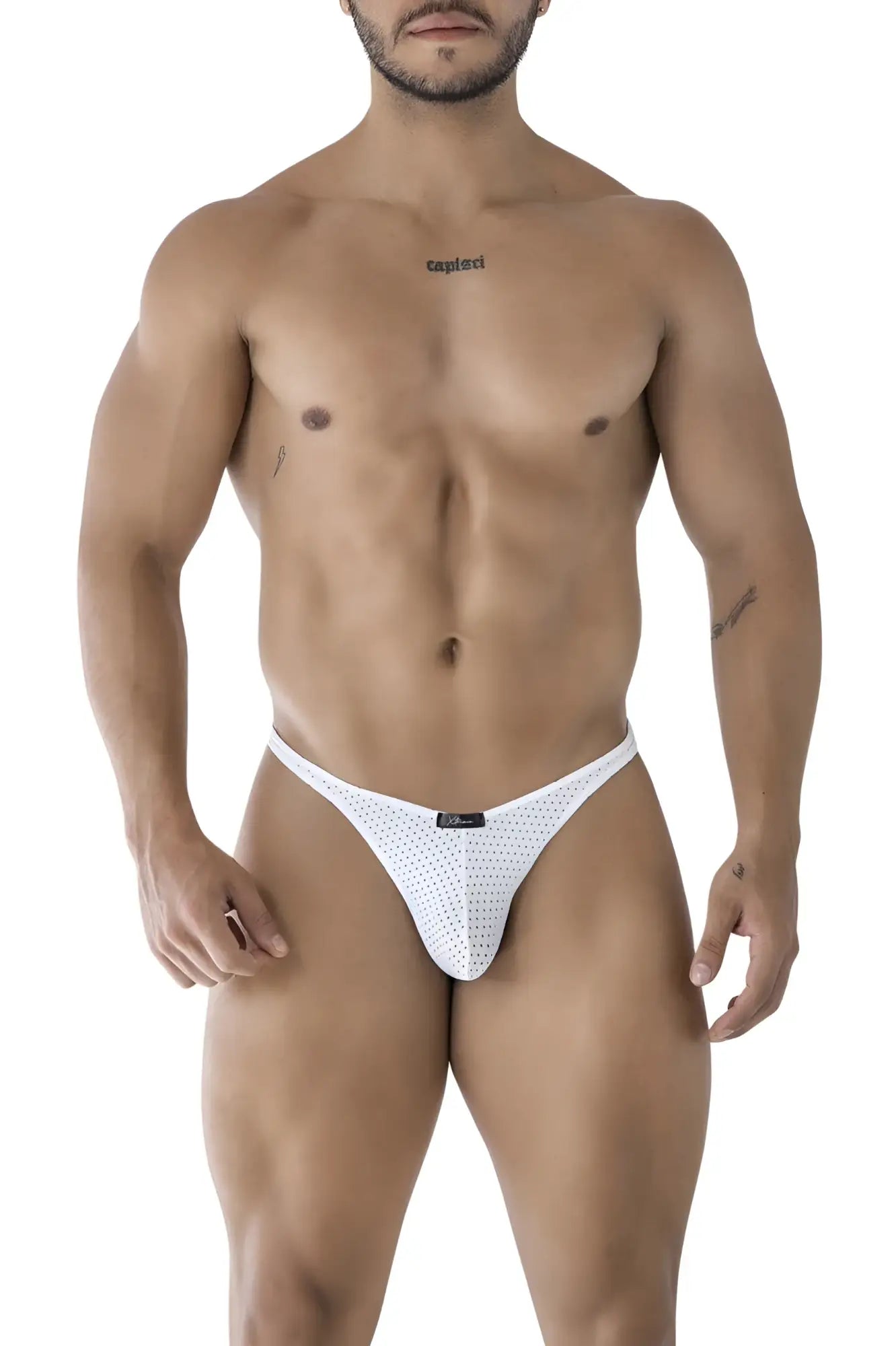 White xtremen 91214b microfiber thong with perforated mesh and small black brand tag at the waistband