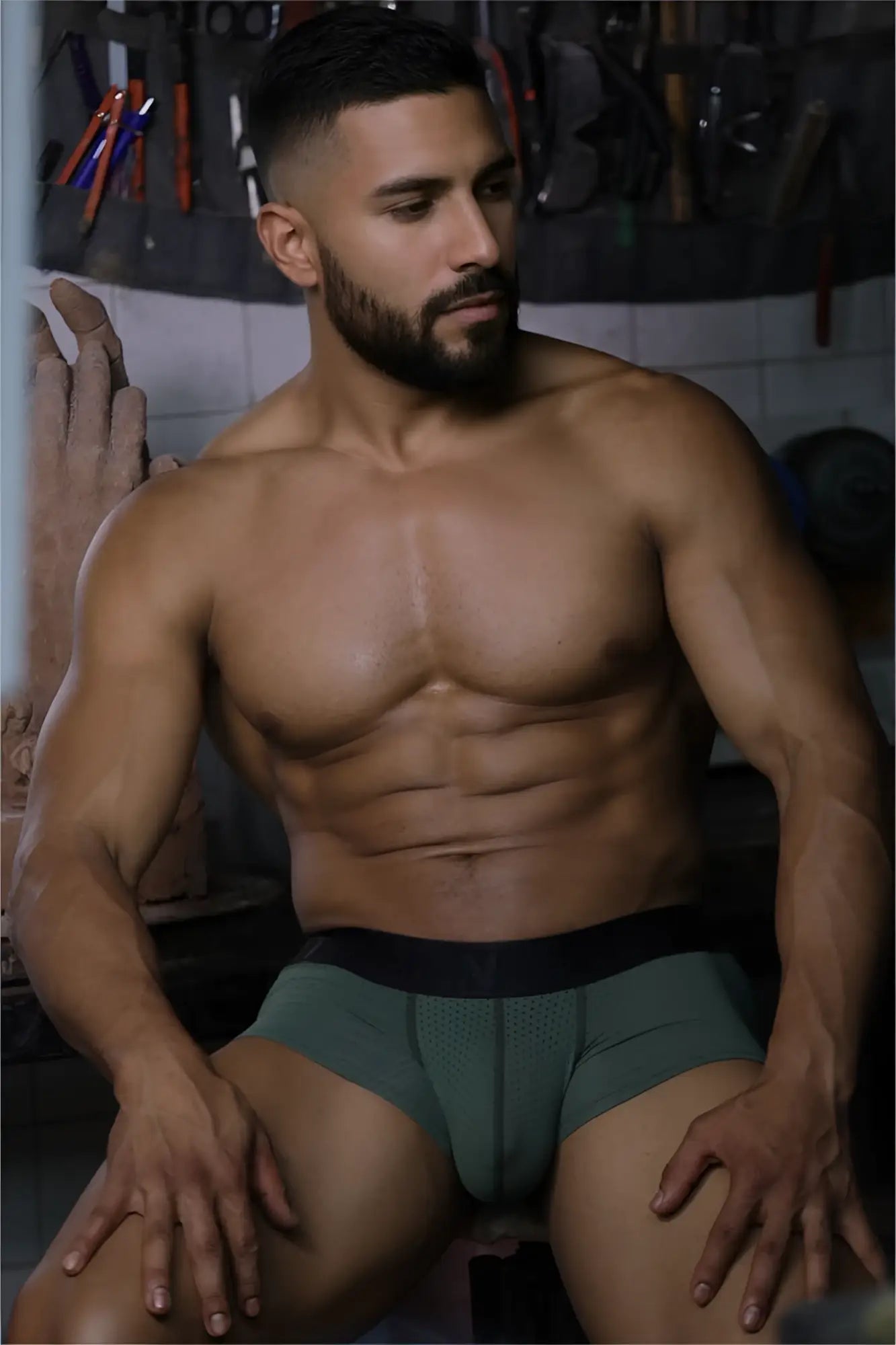A pair of xtremen 91252 microfiber mesh trunks in military green with black waistband and form-fitting boxer brief style