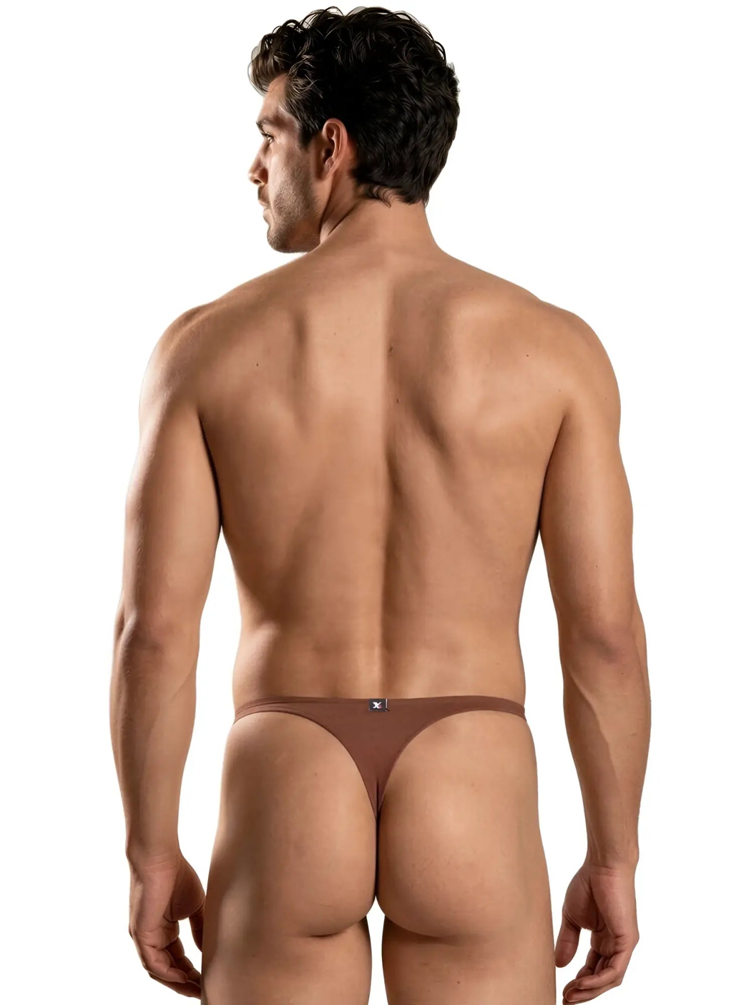Brown microfiber thong with thin waistband and small center-back Xtremen logo tag. Back view.
