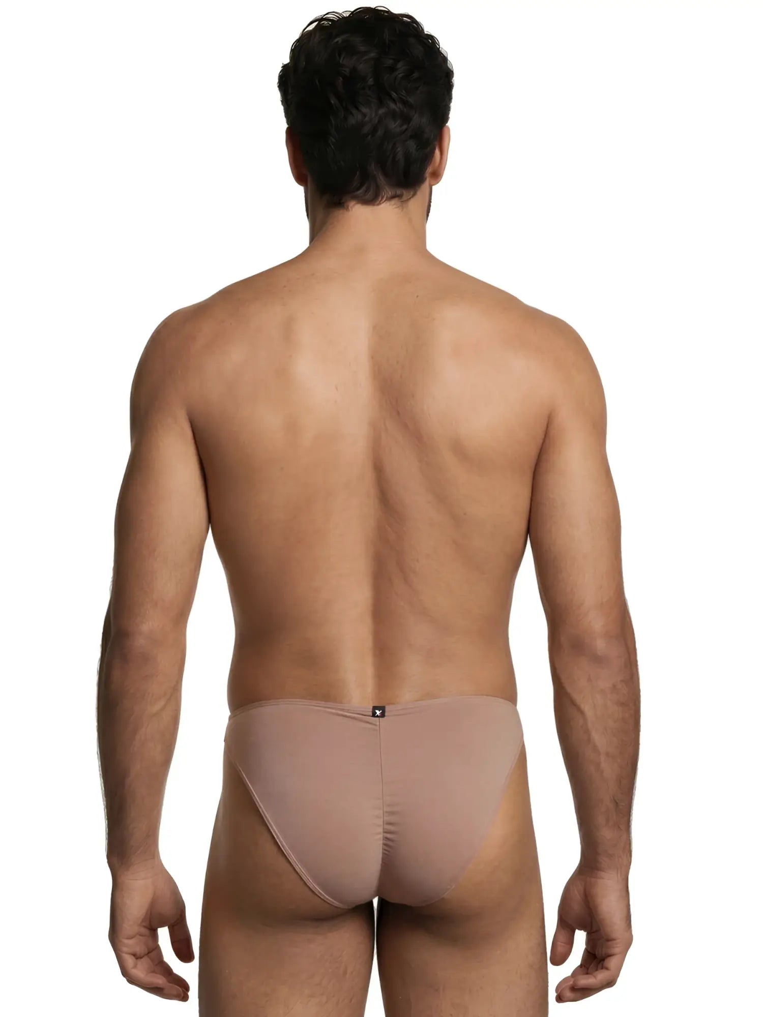 Xtremen men’s nude microfiber bikini brief with a vertical center seam and a small logo tag on the back waistband.