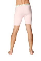 Pink yoga compression shorts with colorful patterned waistband for comfortable activewear and cycling use