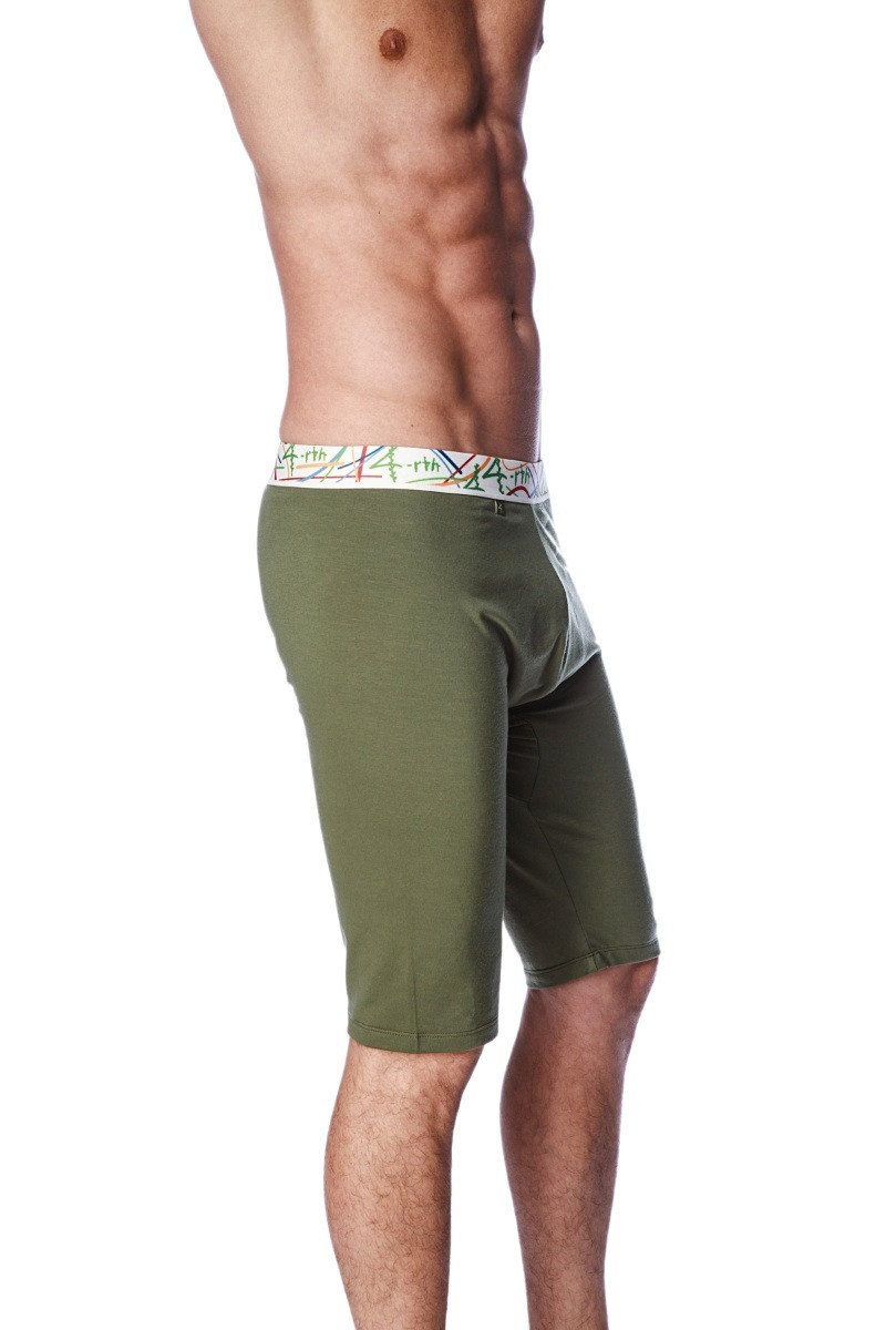 Olive green yoga compression shorts with colorful patterned waistband designed for flexible activewear use