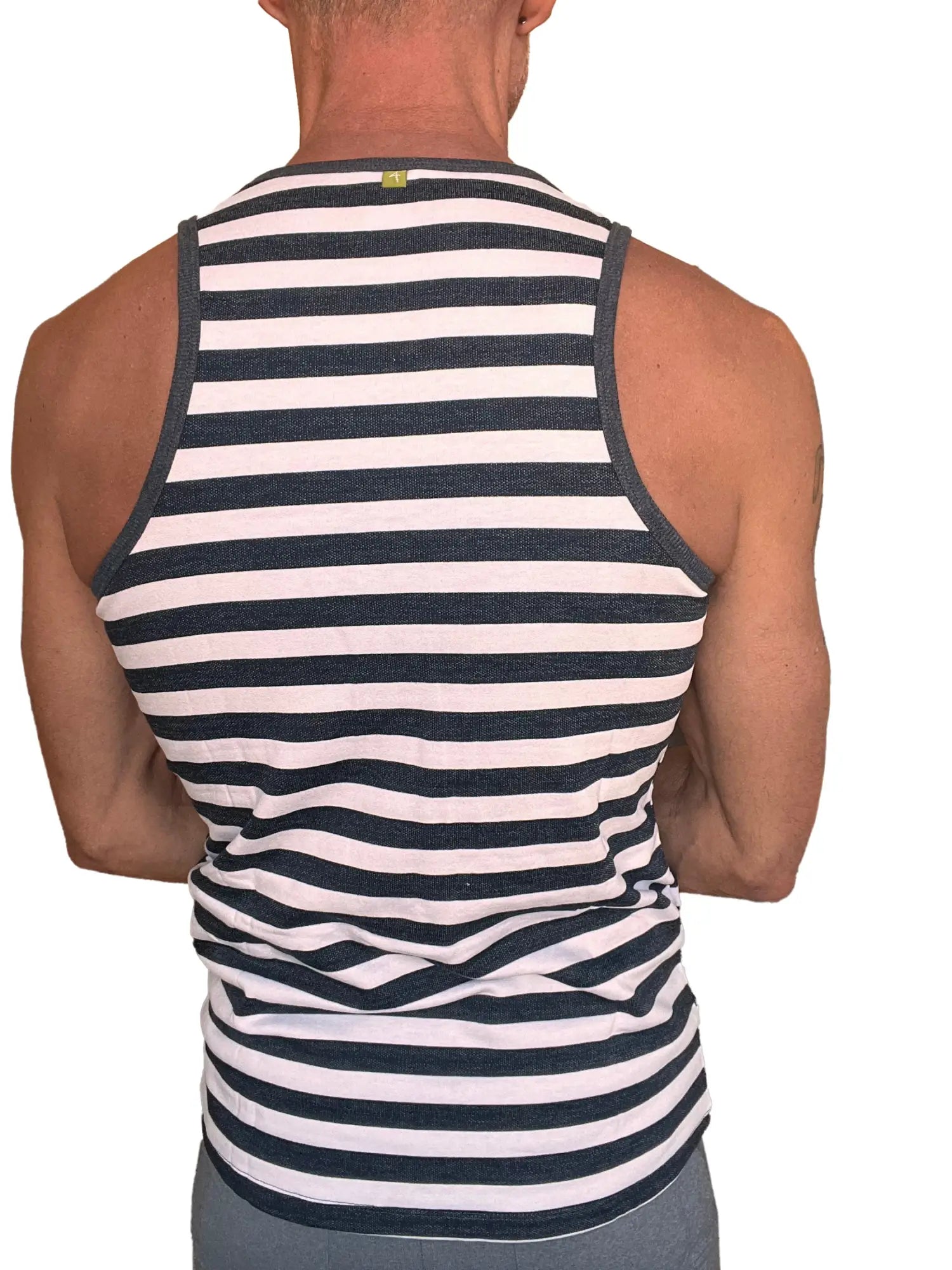 A men’s black and white striped tank top with ribbed neckline and armholes made from nautical fleece sustain material