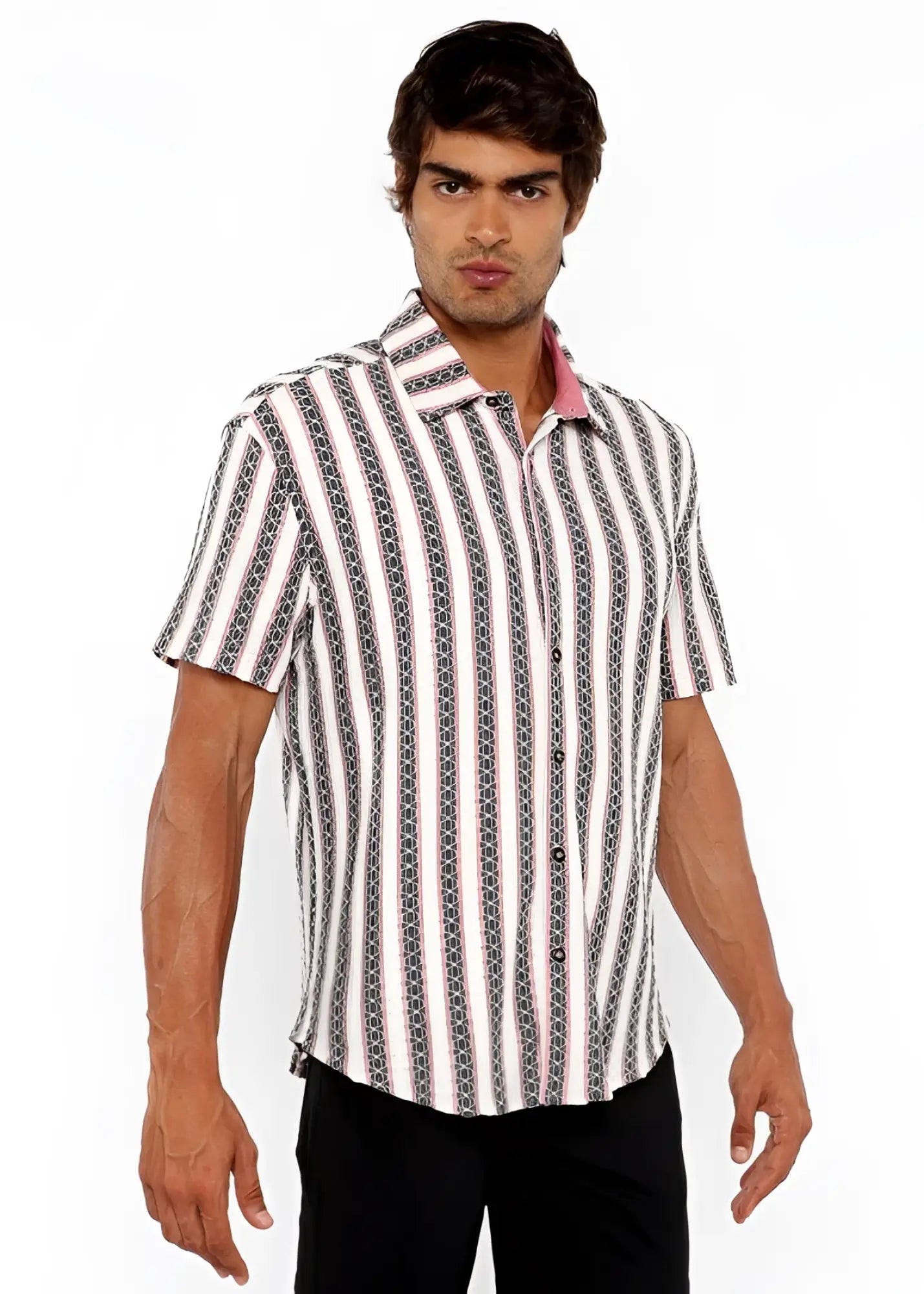 A man wearing a zigzag stripe open stretch knit shirt with white gray and black geometric vertical stripes