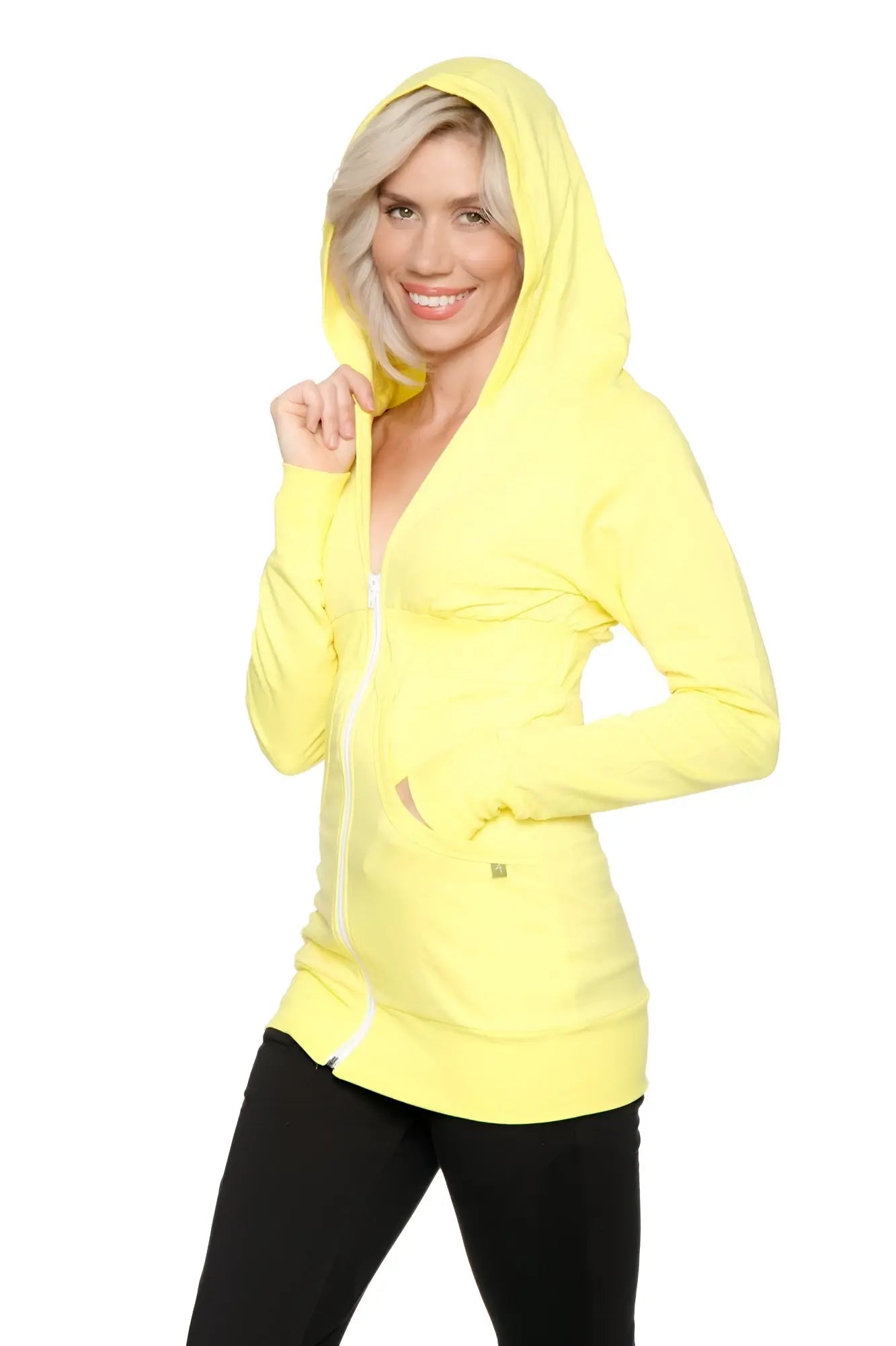 Bright yellow zip-up long body travel hoodie jacket with long sleeves and hood made for travel use