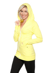 Bright yellow zip-up long body travel hoodie jacket with long sleeves and hood made for travel use